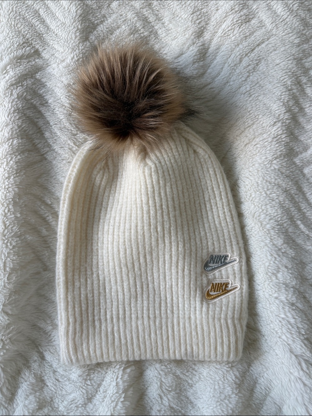 Nike Cream Ribbed Knit Beanie with Brown Faux Fur Pom